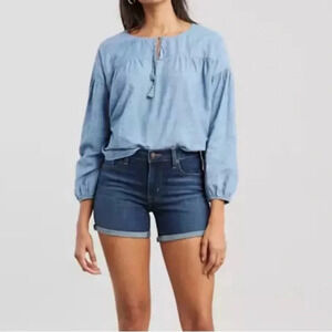 Levi’s mid length shorts Womens size 32 Medium wash Cuffed Denim